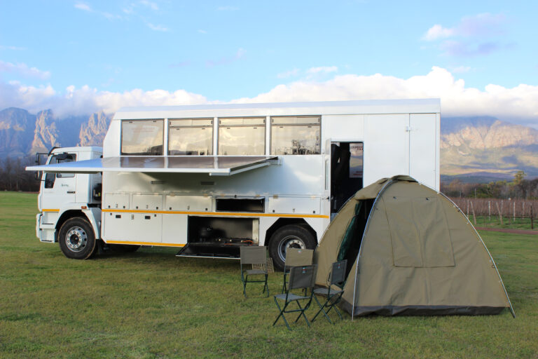 Overland truck parked for night with tent set up in Cederberg