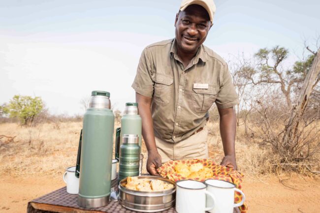 Safari brunch in bush with ranger