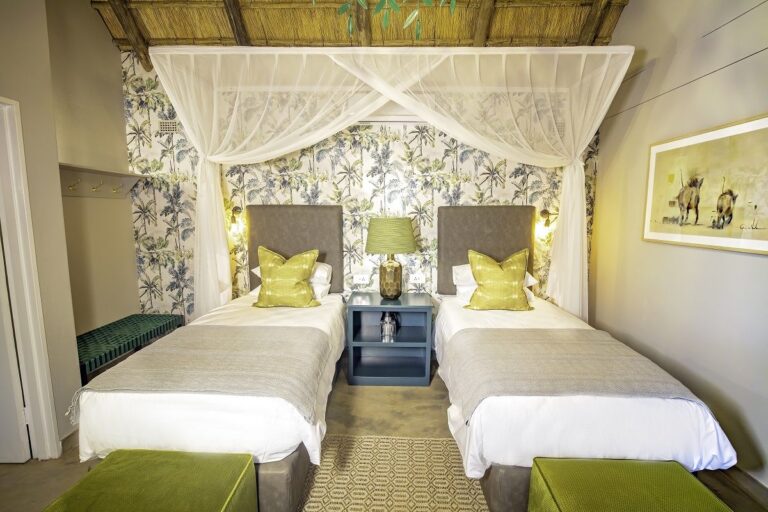 Twin bedroom at Shearwaters Explorers Village Victoria Falls.